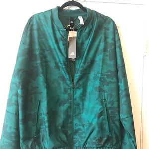 Adidas Men’s Jacket. Zip front with pockets. Large